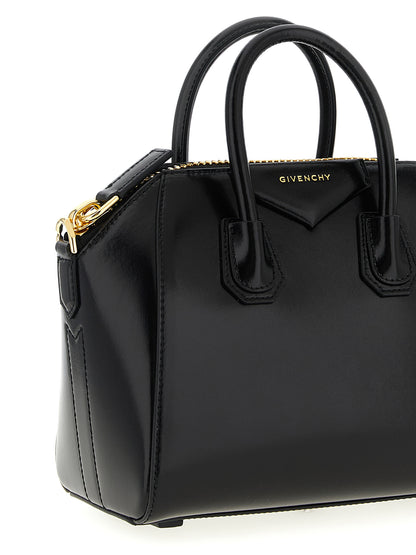 Mini Evening Handbag by Givenchy for women in calfskin leather black & silver features a exquisite silhouette, showcasing a secure and exquisite with versatile shoulder-strap, handle & detachable-strap for a exquisite finish.