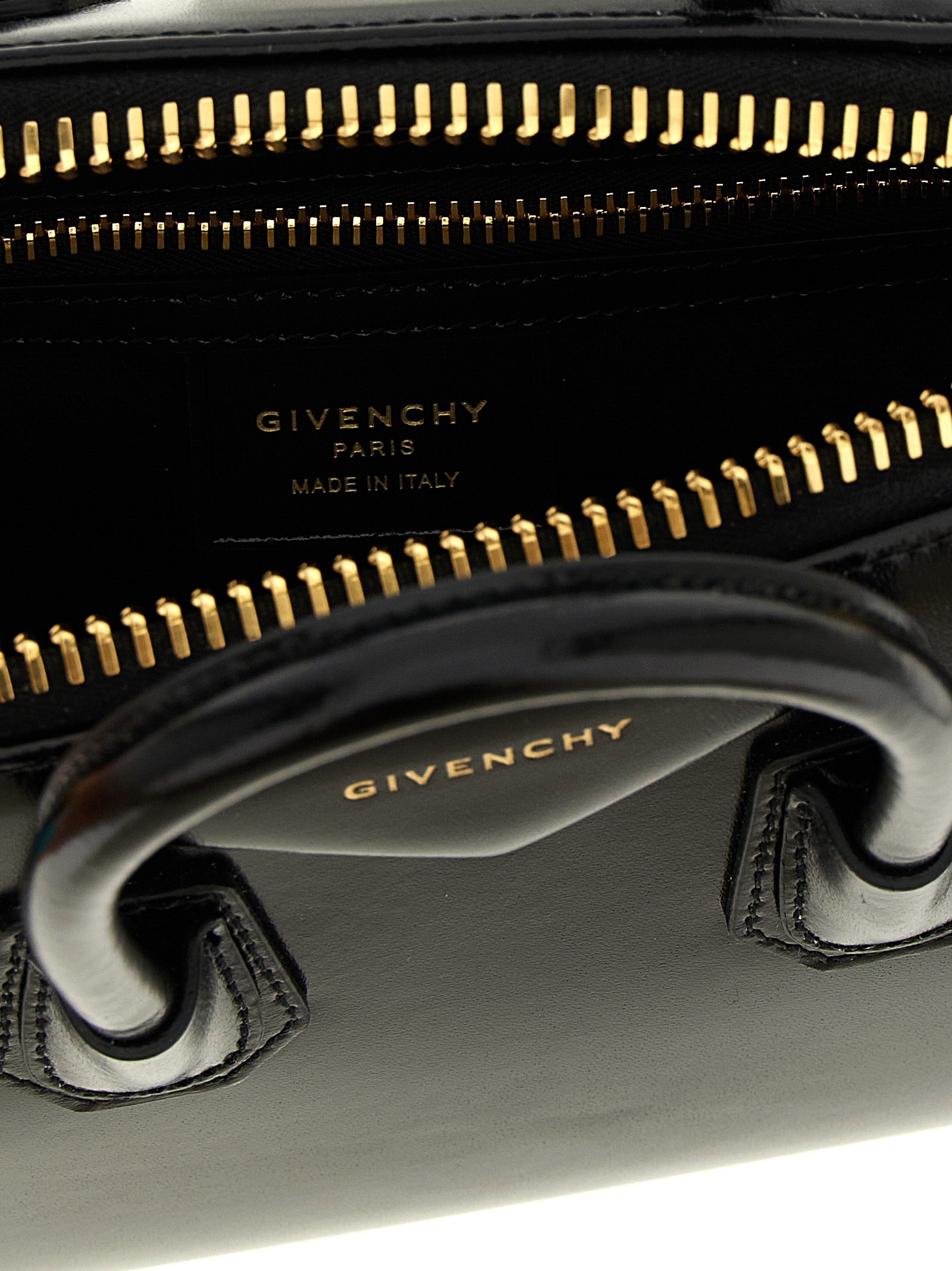 Mini Evening Handbag by Givenchy for women in calfskin leather black & silver features a contemporary silhouette, showcasing a secure , ample , and contemporary shoulder-strap, handle & detachable-strap for a sophisticated look.