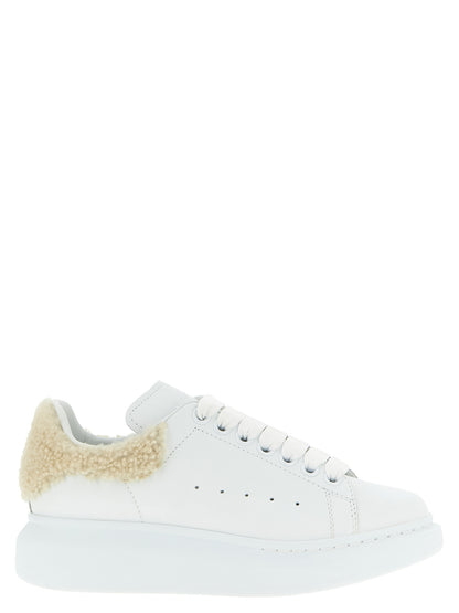 Sneakers by Alexander McQueen for women in calfskin leather beige presents a sumptuous silhouette, artfully capturing the essence of the Women's Chunky Calfskin Leather Sneakers with its sumptuous chunky style design.