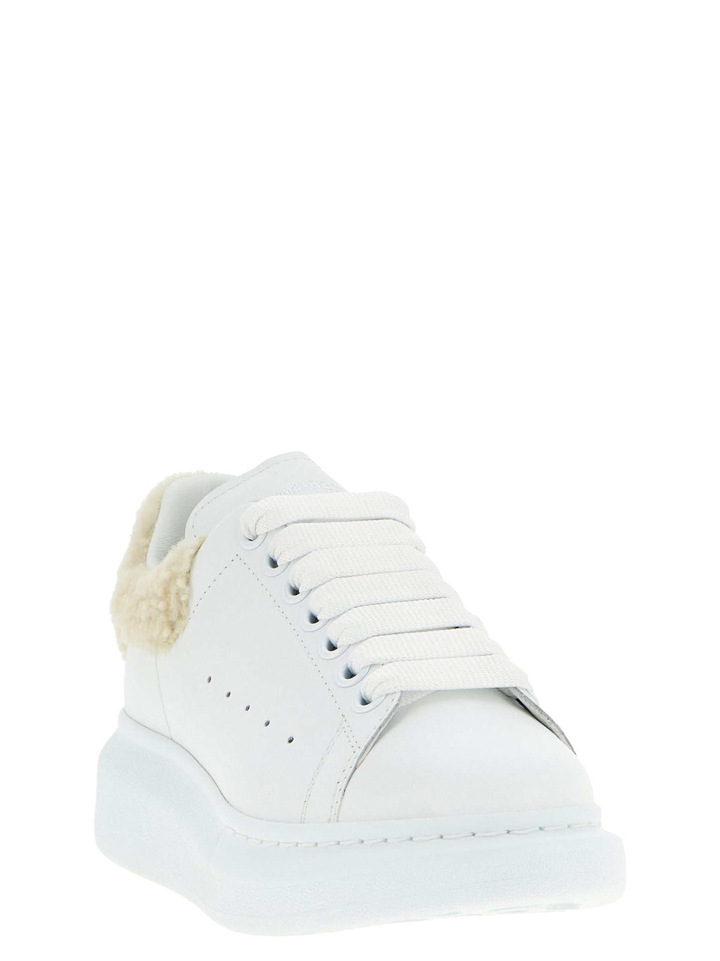 Sneakers by Alexander McQueen for women in calfskin leather beige presents a impeccable silhouette as Women's Chunky Calfskin Leather Sneakers, expertly defined by a impeccable chunky style for a impeccable, high-fashion look.