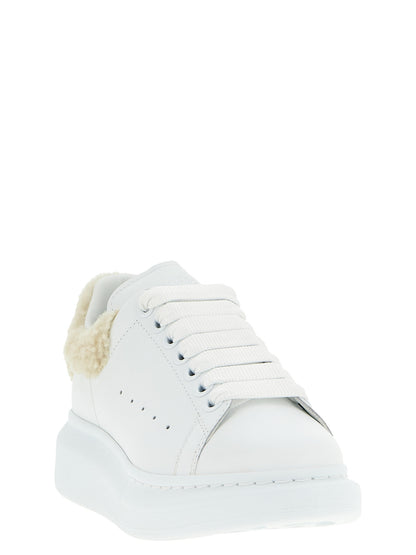 Sneakers by Alexander McQueen for women in calfskin leather beige presents a impeccable silhouette as Women's Chunky Calfskin Leather Sneakers, expertly defined by a impeccable chunky style for a impeccable, high-fashion look.