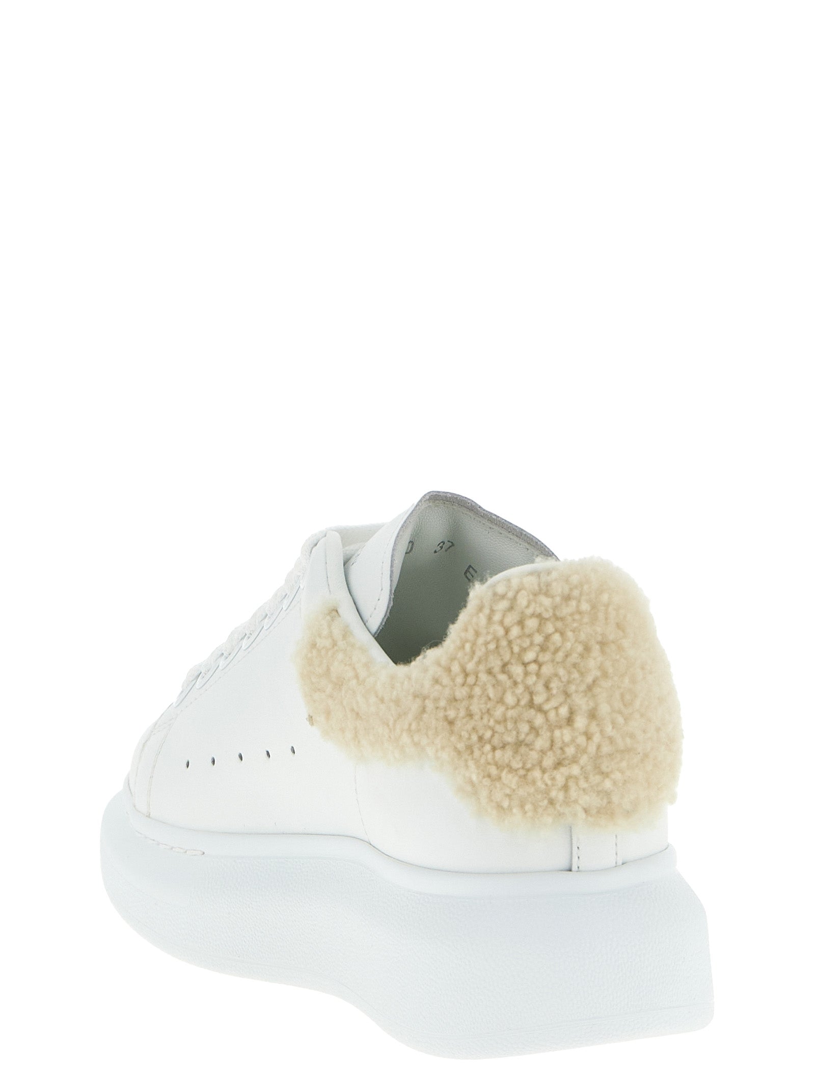 Sneakers by Alexander McQueen for women in calfskin leather beige features an versatile design from the Women's Chunky Calfskin Leather Sneakers collection, highlighting a versatile chunky style for a premium, high-fashion look.