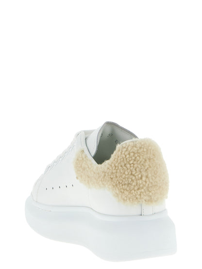 Sneakers by Alexander McQueen for women in calfskin leather beige features an versatile design from the Women's Chunky Calfskin Leather Sneakers collection, highlighting a versatile chunky style for a premium, high-fashion look.