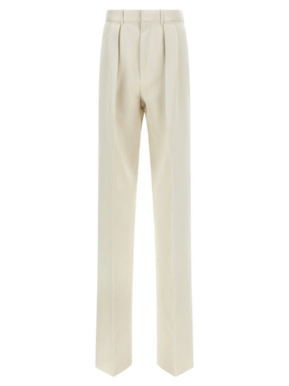 Trousers by Tom Ford for men in cotton silk & iron beige features an sartorial silhouette, showcasing a precise straight-leg and long with a sartorial for a refined look.