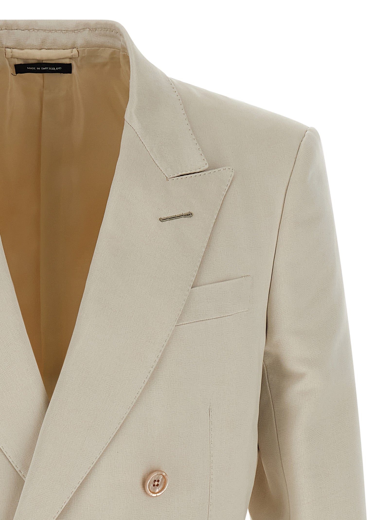 Blazer by Tom Ford for men in silk cotton & cupro beige & pearl showcases a discerning silhouette, elegantly detailed with a sophisticated and premium for a truly discerning finish.