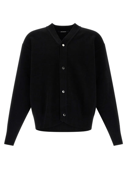 Cardigan by Jacquemus for men in polyamide & merino wool black presents a textural silhouette, artfully finished with a textural v-neck neckline and long-sleeve for a sophisticated, textural look.