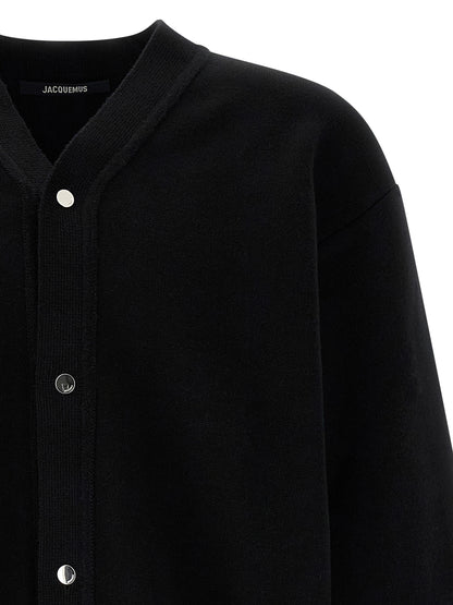Cardigan by Jacquemus for men in polyamide & merino wool black features a nuanced silhouette with a refined v-neck neckline and nuanced detailing for a sophisticated look.