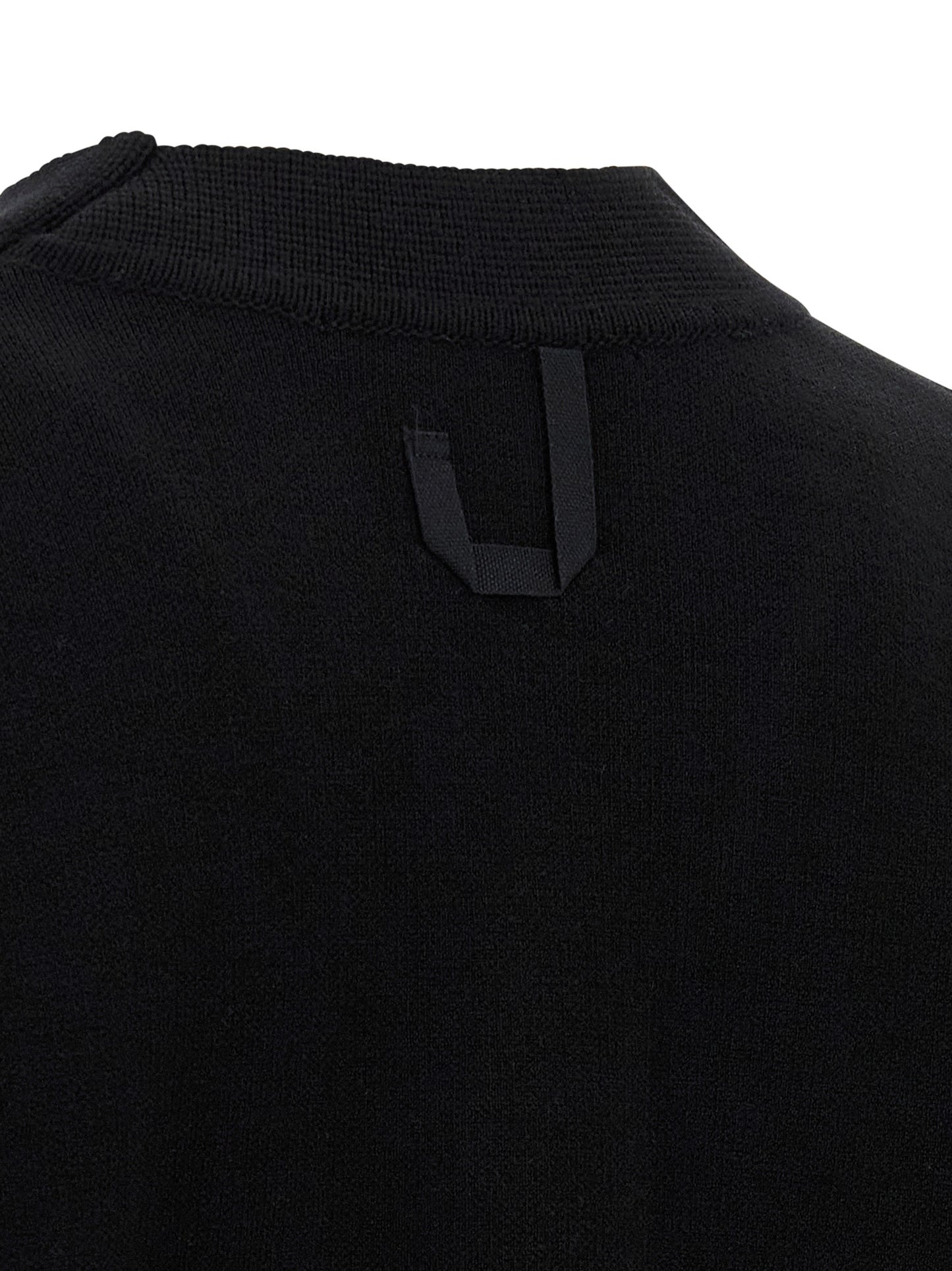 Cardigan by Jacquemus for men in polyamide & merino wool black showcases a luxurious silhouette, meticulously detailed with a sophisticated and for a refined finish.