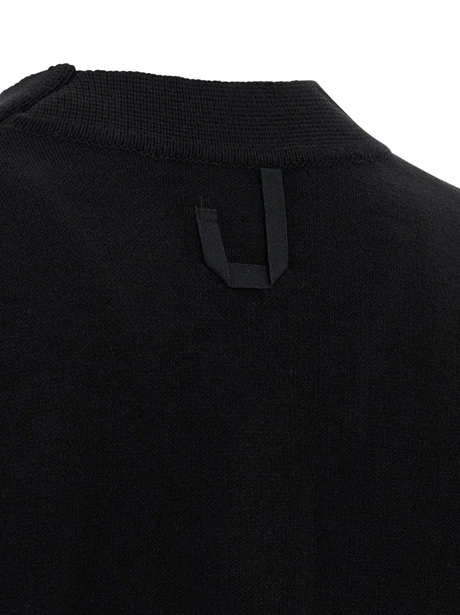 Cardigan by Jacquemus for men in polyamide & merino wool black showcases a luxurious silhouette, meticulously detailed with a sophisticated and for a refined finish.