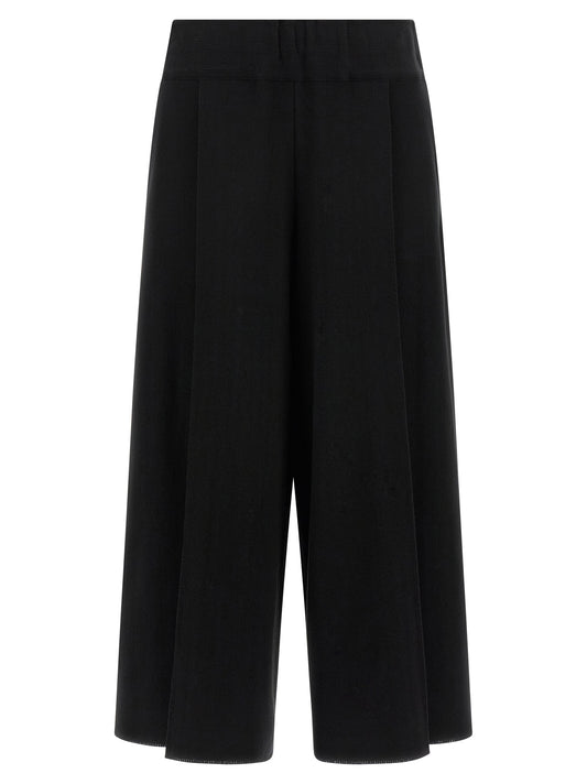 Casual Pants by Issey Miyake for women in polyurethane & nylon black features an refined tailoring silhouette, showcasing a premium wide with a and long cut for a refined tailoring look.