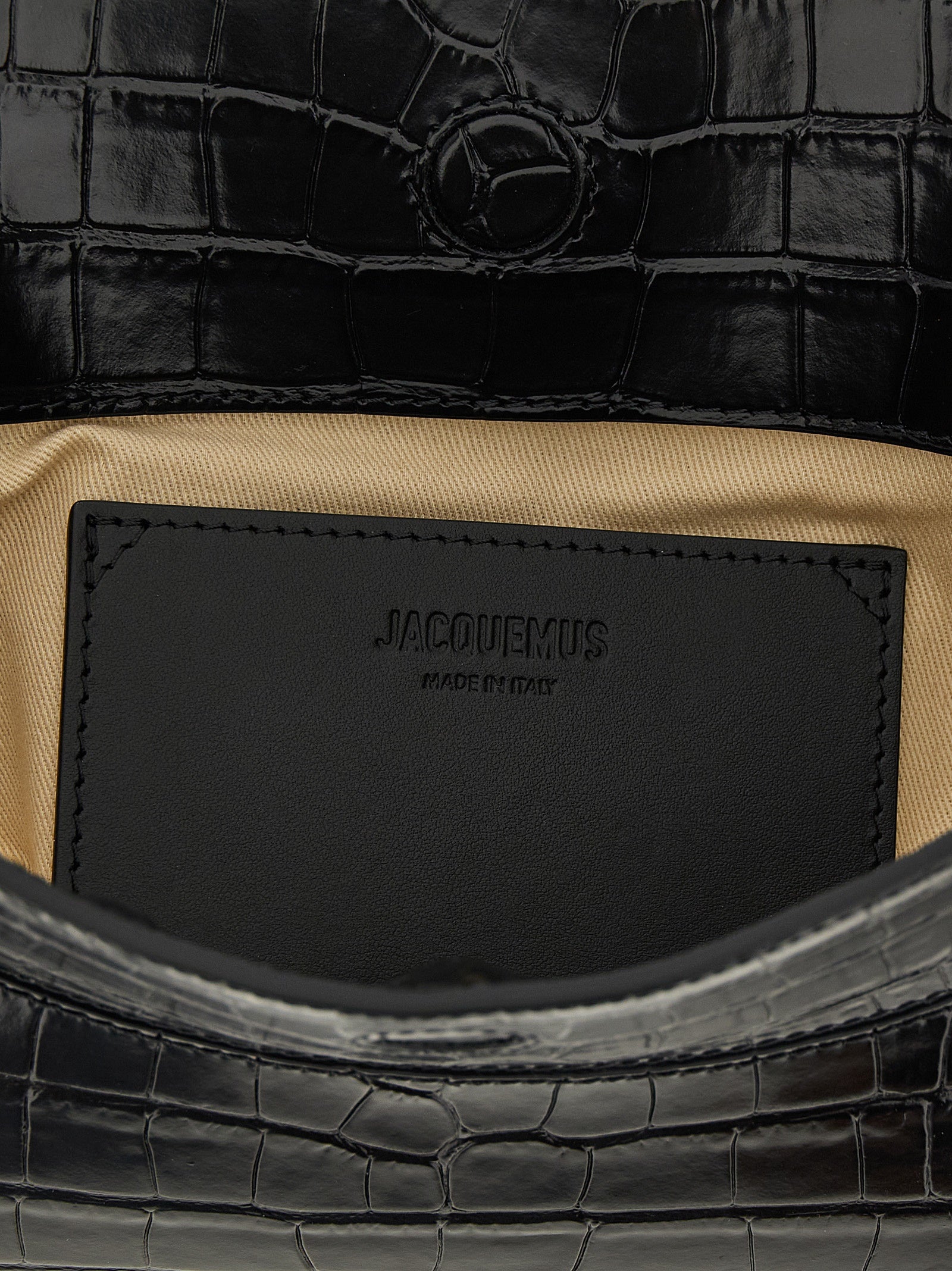 Shoulder Flap Bag by Jacquemus for women in croc skin bos taurus suede calf leather black & print features a effortless chic silhouette with a secure flap, magnetic & button, ample , and versatile shoulder-strap & handle for a effortless chic finish.