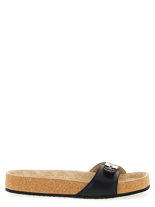 Sliders Sandals Flat Shoes by Balenciaga for women in calfskin & cork black showcases a resplendent Icon Women's Calfskin & Cork Sliders Sandals Flat Shoes aesthetic with a and .