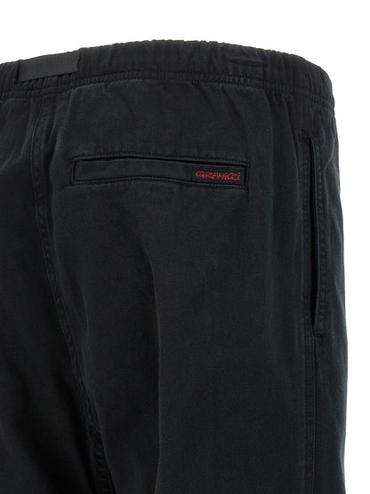 Trousers by Gramicci for men in organic cotton twill black features an on trend silhouette, showcasing a sophisticated wide with a long and for an on trend finish.