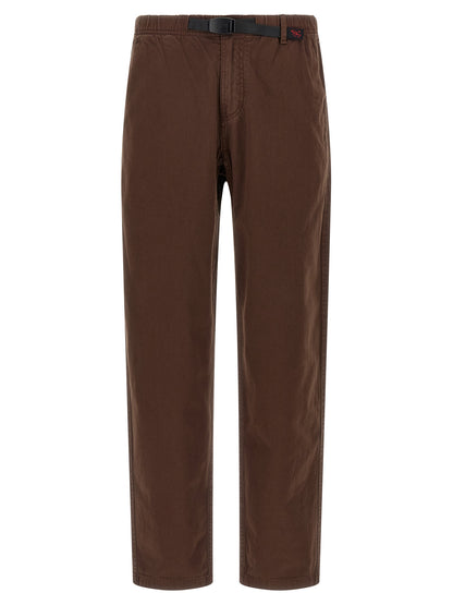 Trousers by Gramicci for men in organic cotton twill brown presents a smart silhouette, meticulously detailed with a smart wide, a smart long, and a smart .