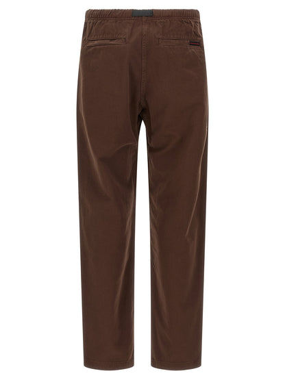 Trousers by Gramicci for men in organic cotton twill brown features a tailored silhouette with a tailored wide, defined by its long and a sophisticated .