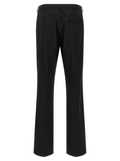 Trousers by Balenciaga for men in wool twill black features a tailored silhouette with a tailored , defined by its long and a sophisticated .