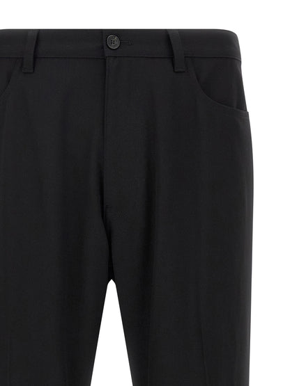 Trousers by Balenciaga for men in wool twill black presents a smart silhouette, meticulously detailed with a smart , a smart long, and a smart .