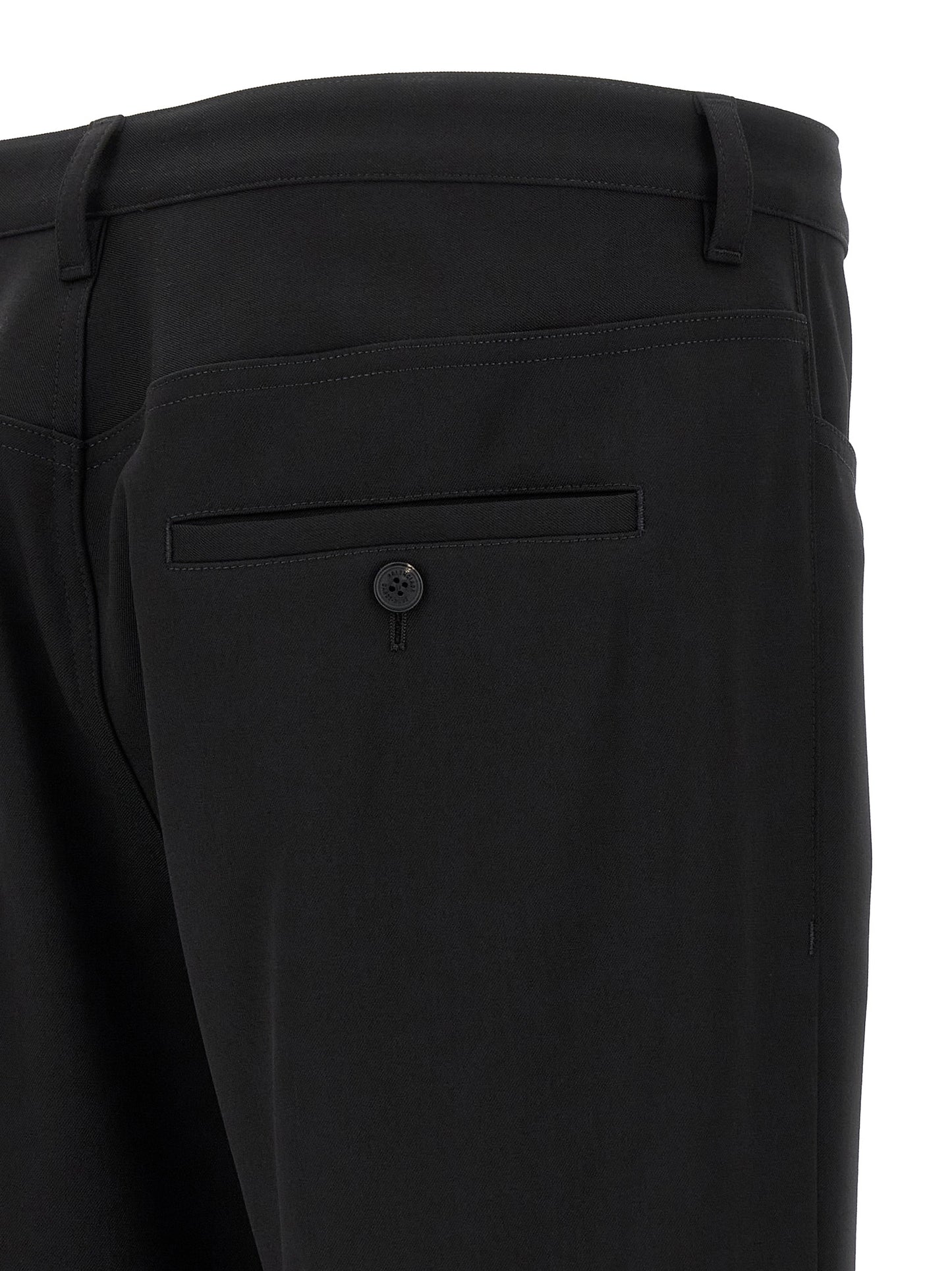 Trousers by Balenciaga for men in wool twill black presents a perennial silhouette, meticulously tailored with a cut, long finish, and an elegant .