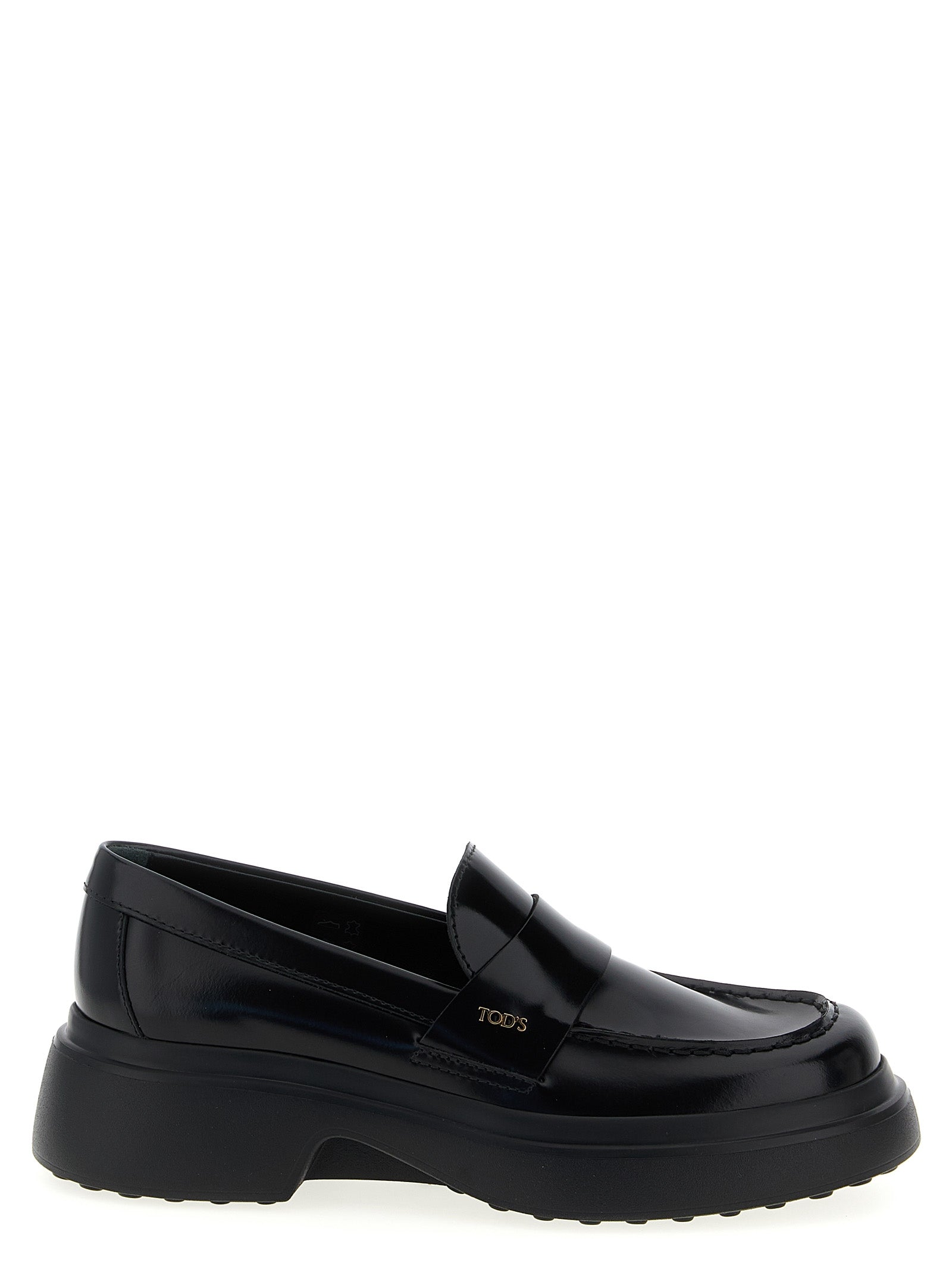 Flat Loafer Slip-On Shoes by Tod's for women in calfskin leather black showcases a resplendent Women's Calfskin Leather Flat Loafer Slip-On Shoes aesthetic, defined by its resplendent and elegant flat.