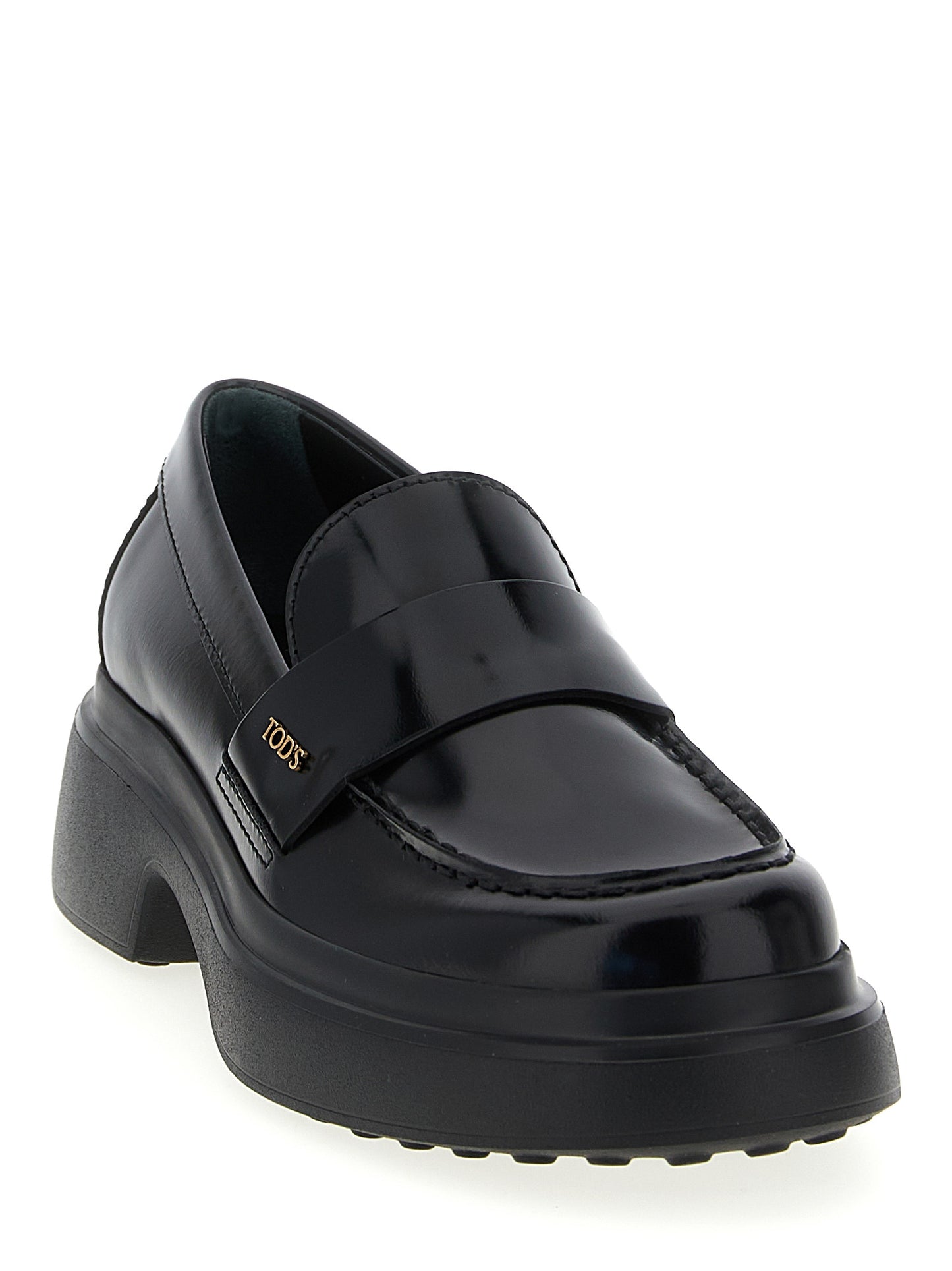 Flat Loafer Slip-On Shoes by Tod's for women in calfskin leather black features an dynamic silhouette from the Women's Calfskin Leather Flat Loafer Slip-On Shoes collection, defined by a dynamic and flat for a dynamic look.