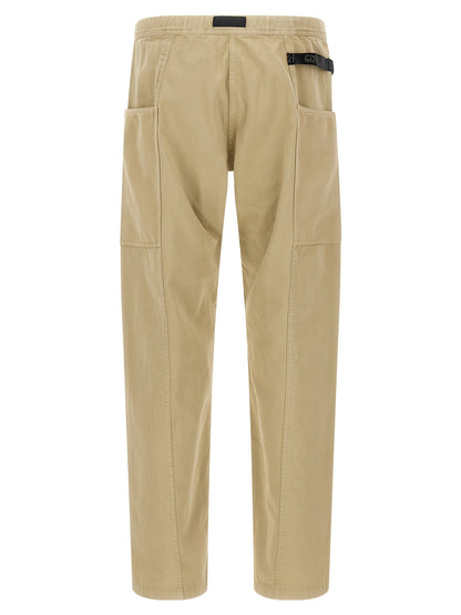 Casual Pants by Gramicci for men in cotton twill beige presents a refined pantology silhouette, artfully defined by a refined pantology , long, and a sophisticated .