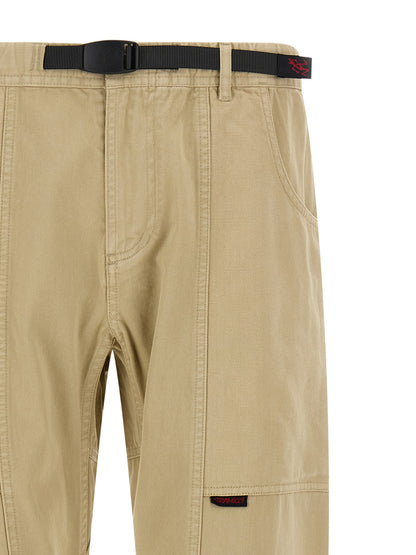 Casual Pants by Gramicci for men in cotton twill beige features a polished silhouette with a polished , reaching a polished long and finished with a polished .