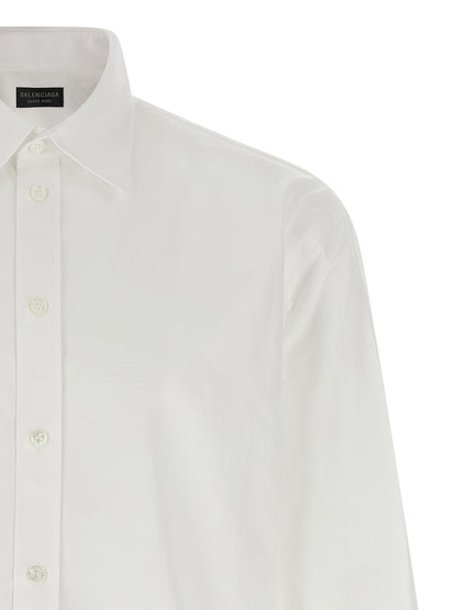 Blouse by Balenciaga for men in cotton white presents a discerning silhouette, showcasing a sophisticated and for a truly discerning finish.