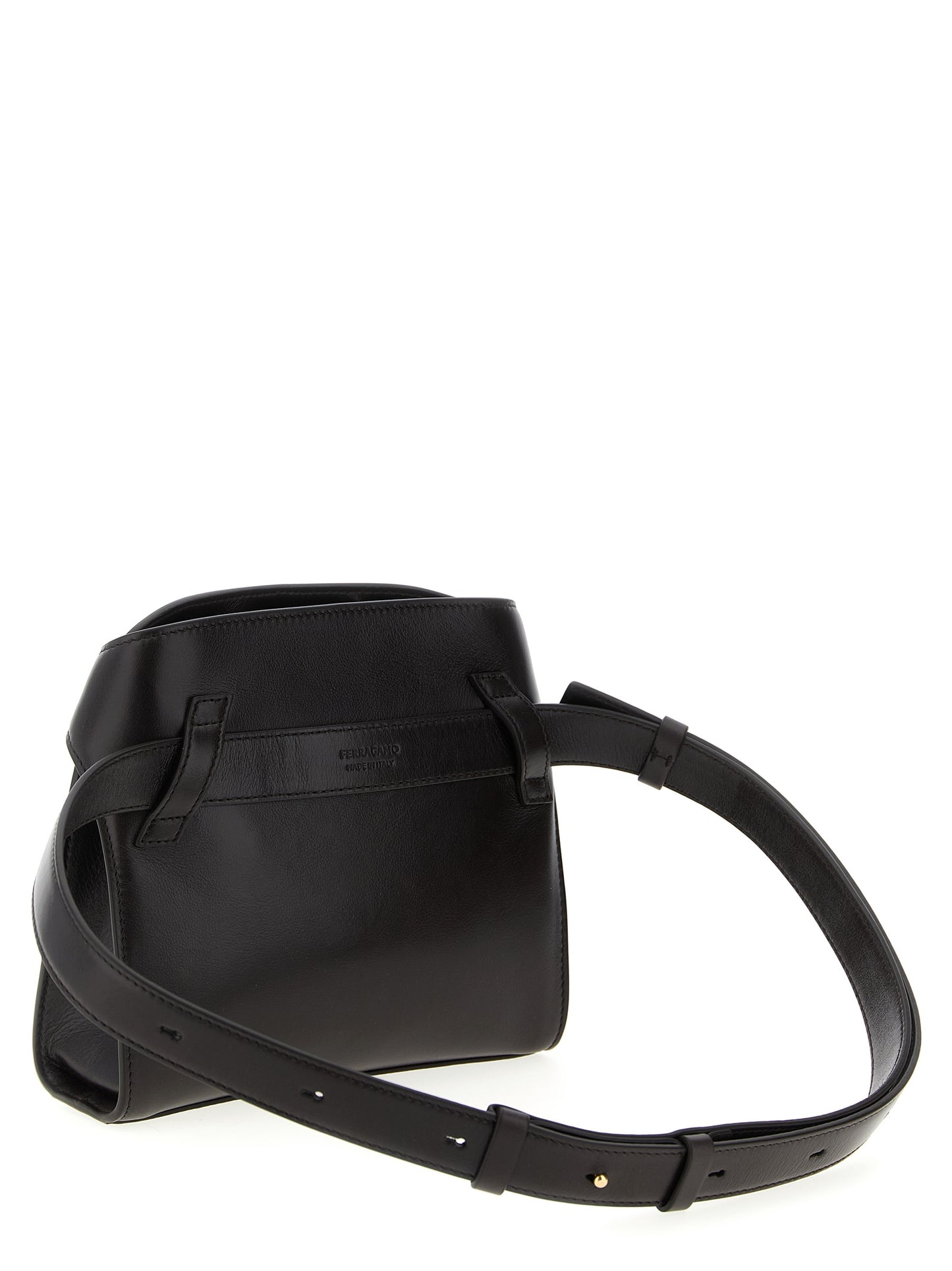 Crossbody Fanny Pack Handbag by Ferragamo for women in bos taurus suede calf leather brown features a transformative sophistication silhouette, showcasing a secure flap, magnetic & buckle, ample , and versatile crossbody-strap, shoulder-strap & belt-strap for a transformative sophistication look.