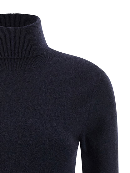 Cardigan by Balenciaga for women in polyamide & cashmere blue presents a textural silhouette, artfully finished with a textural turtle high-neck neckline and for a sophisticated, textural look.