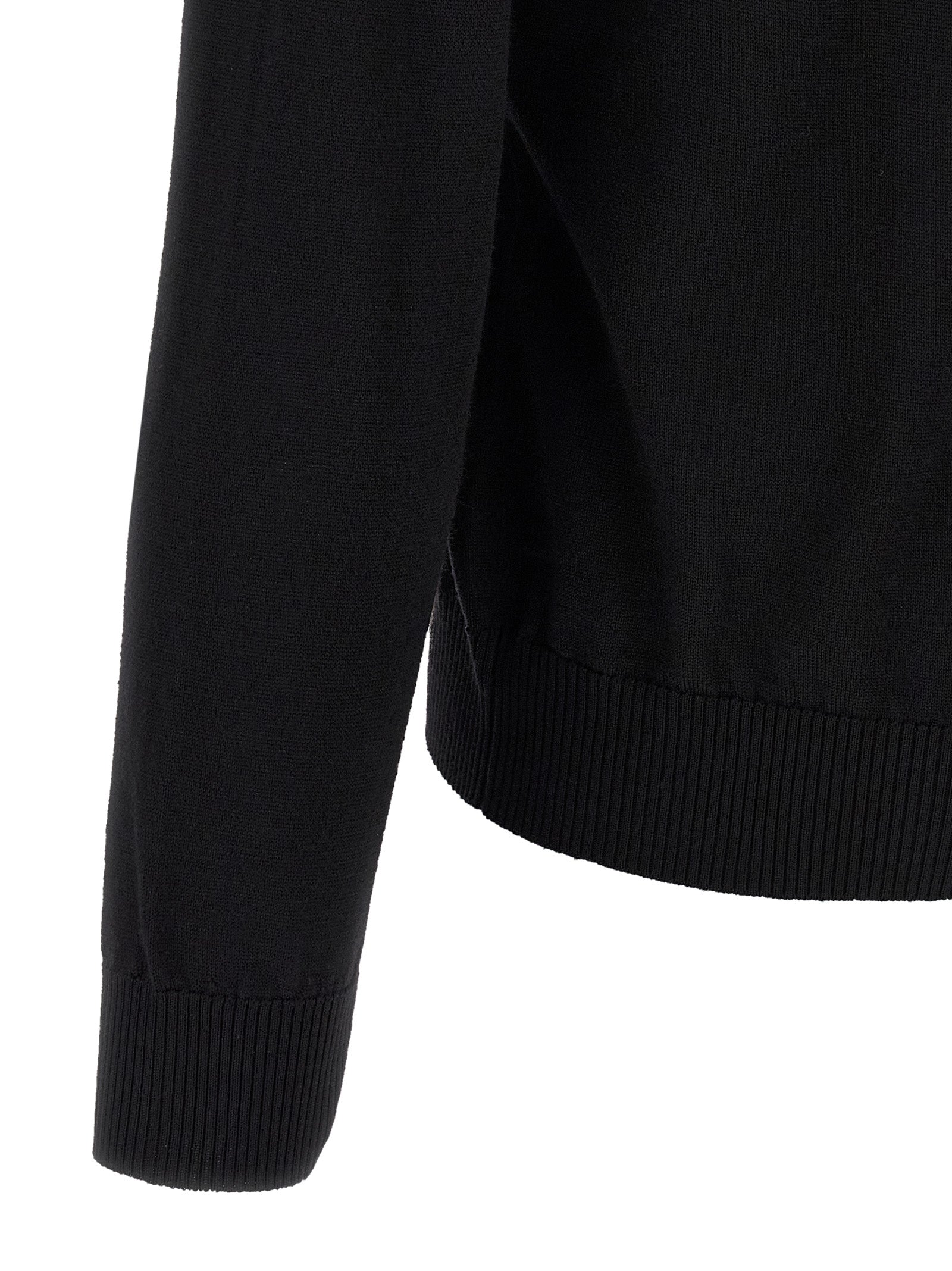 Cardigan by Fendi for men in black features a nuanced silhouette with a refined and nuanced detailing for a sophisticated look.