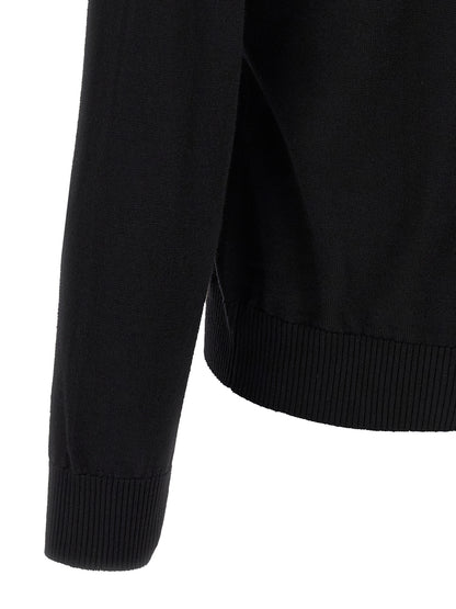 Cardigan by Fendi for men in black features a nuanced silhouette with a refined and nuanced detailing for a sophisticated look.