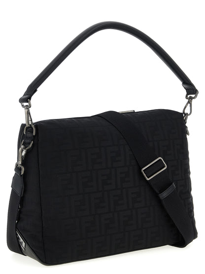 Large Shoulder Bag by Fendi for men in calf leather & poly nylon black presents a versatile silhouette, showcasing a secure zipper and versatile with versatile shoulder-strap, adjustable-strap, detachable-strap & handle for a sophisticated look.