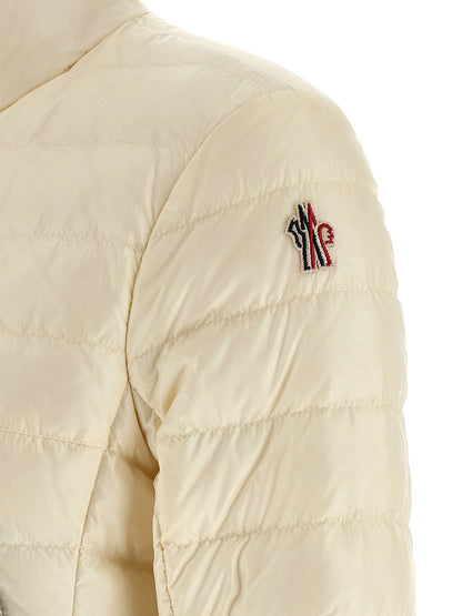 Puffer Jacket by Moncler Grenoble for women in polyamide & goose-down white & signature features a dramatic silhouette, showcasing a sophisticated and distinctive insulated for a dramatic aesthetic.