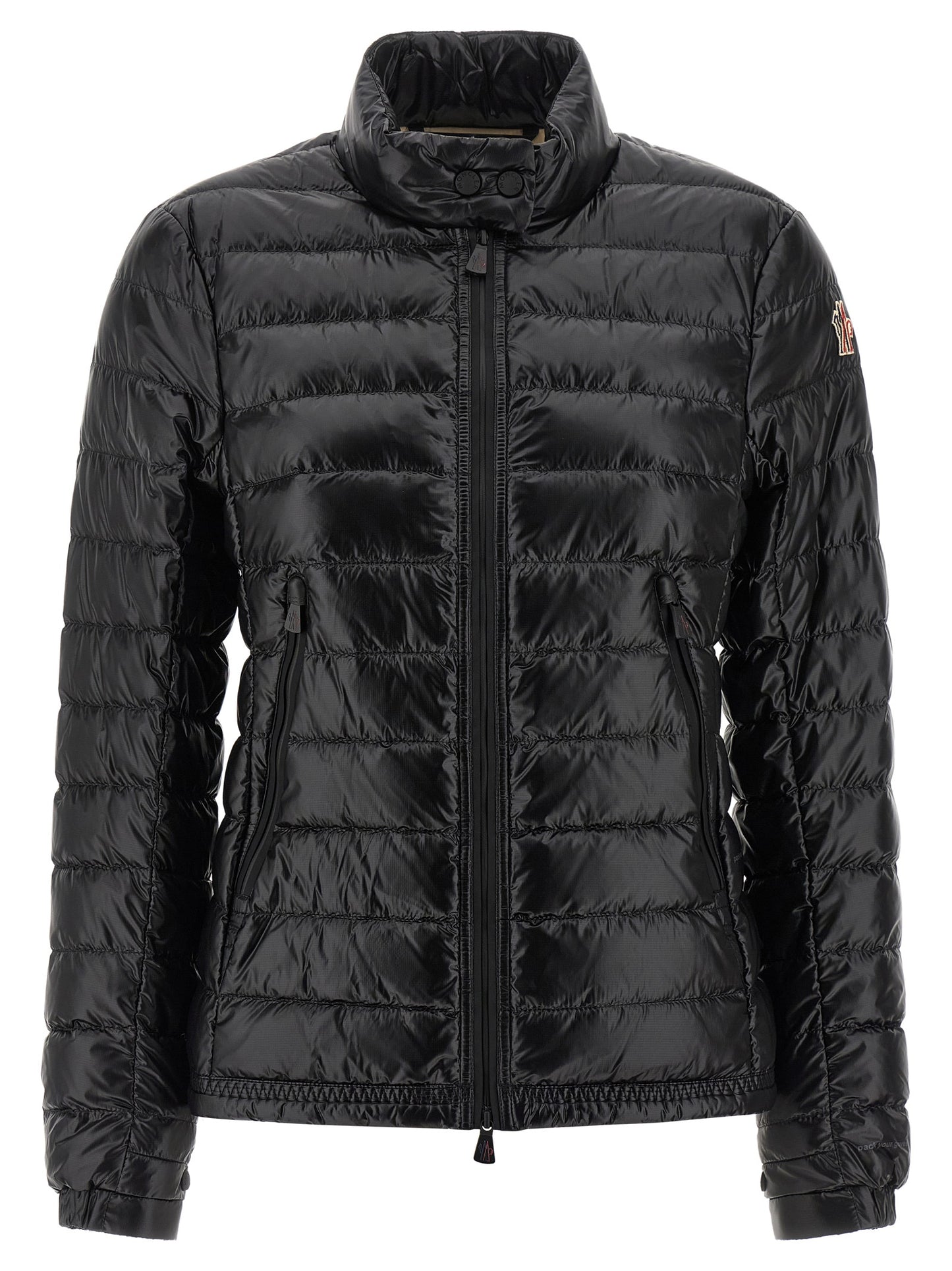 Puffer Jacket by Moncler Grenoble for women in nylon & goose-down black & signature features a dramatic silhouette, showcasing a sophisticated high-neck neckline and distinctive insulated for a dramatic aesthetic.