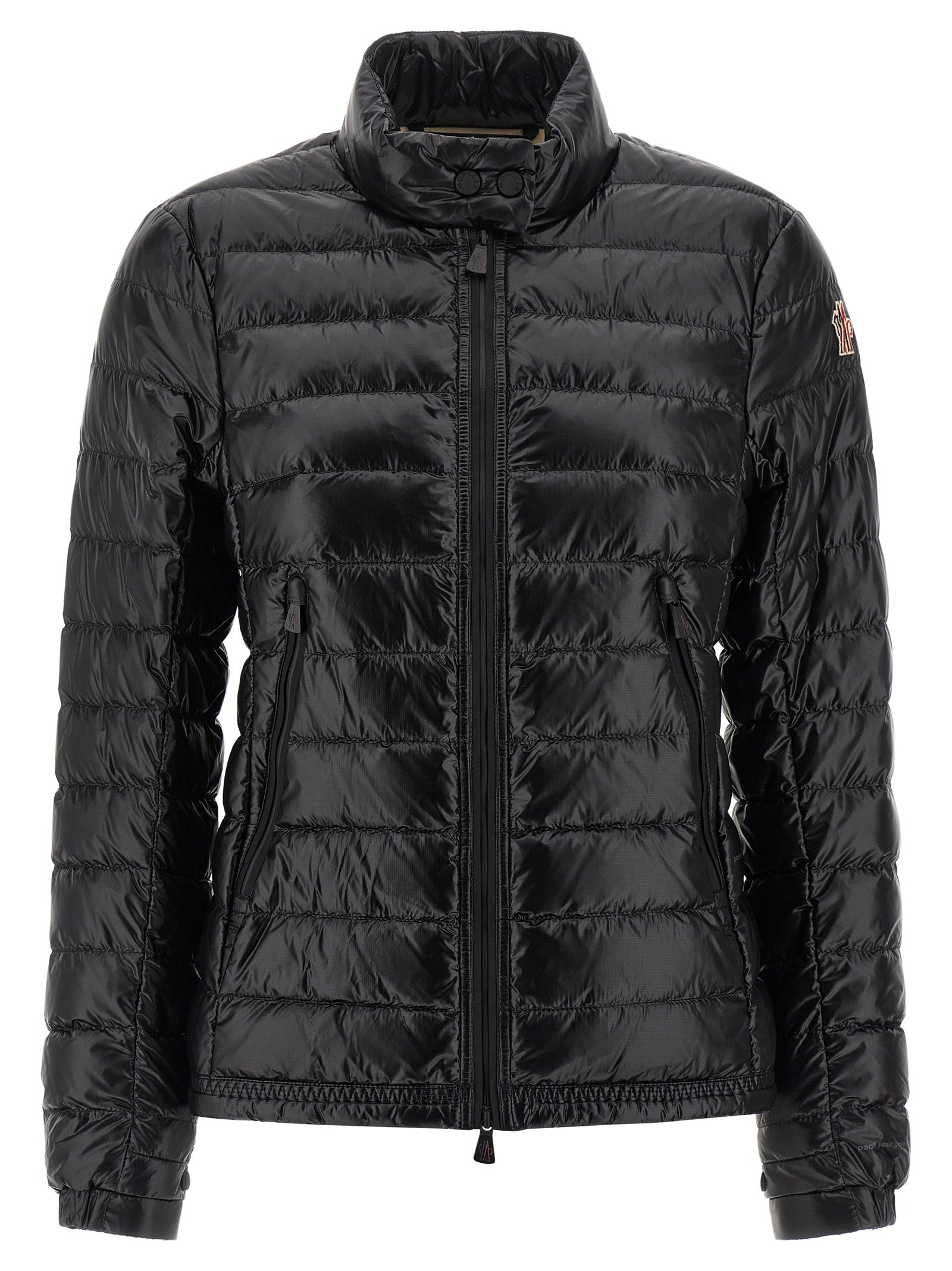 Puffer Jacket by Moncler Grenoble for women in nylon & goose-down black & signature features a dramatic silhouette, showcasing a sophisticated high-neck neckline and distinctive insulated for a dramatic aesthetic.