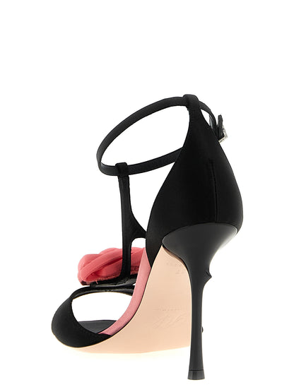 Stiletto T-Strap Strap Sandals by Roger Vivier for women in viscose silk satin & leather and black, rose & floral presents a captivating silhouette, showcasing the signature style of the Women's Viscose Silk Satin & Leather Stiletto T-Strap Strap Sandals with a captivating stiletto and captivating .