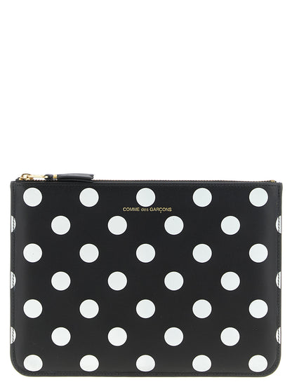 Cardholder Card Case by Comme Des Garçons for unisex in leather bicolour, black, white & print features a polished Leather Cardholder Card Case design with polished card-organization.