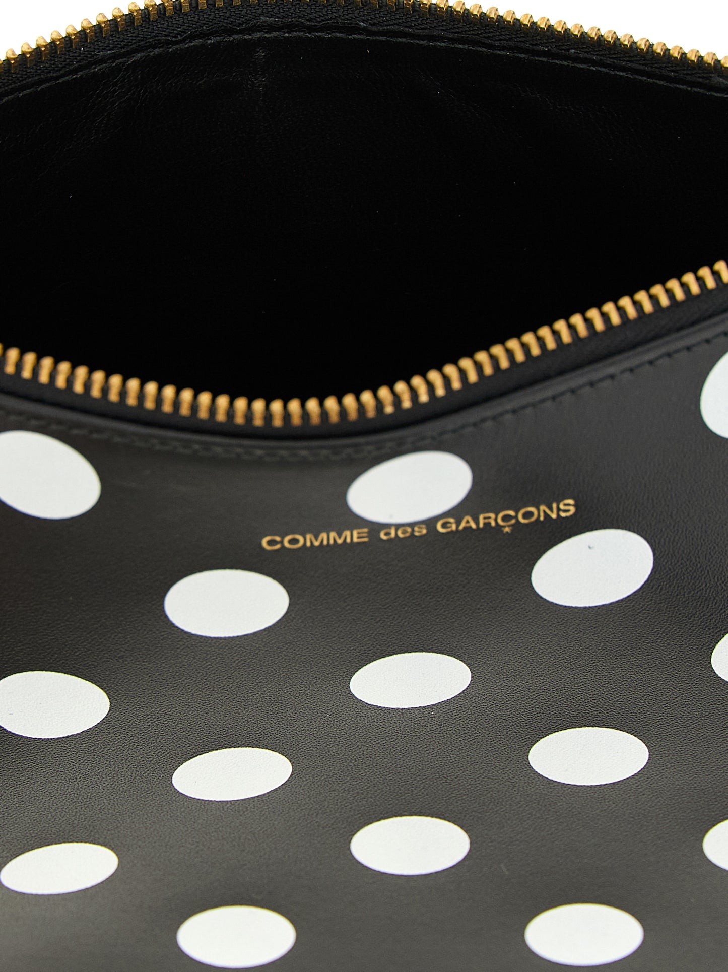 Cardholder Card Case by Comme Des Garçons for unisex in leather bicolour, black, white & print features a distinguished silhouette, showcasing the distinguished design of the Leather Cardholder Card Case with refined card-organization.