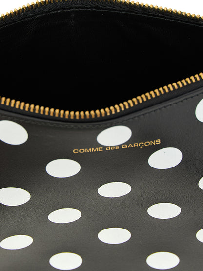 Cardholder Card Case by Comme Des Garçons for unisex in leather bicolour, black, white & print features a distinguished silhouette, showcasing the distinguished design of the Leather Cardholder Card Case with refined card-organization.