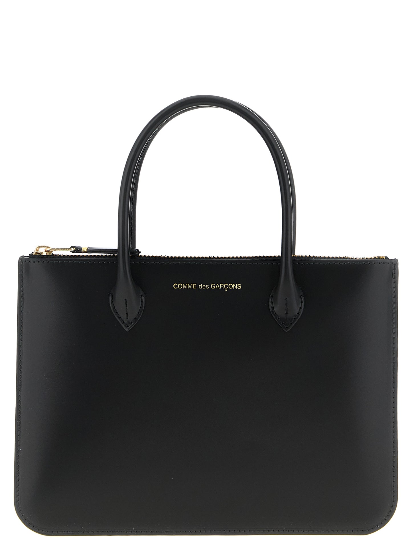 Handbag by Comme Des Garçons for unisex in leather black features an refined silhouette, showcasing a secure zipper, ample , and versatile handle for a sophisticated refined aesthetic.