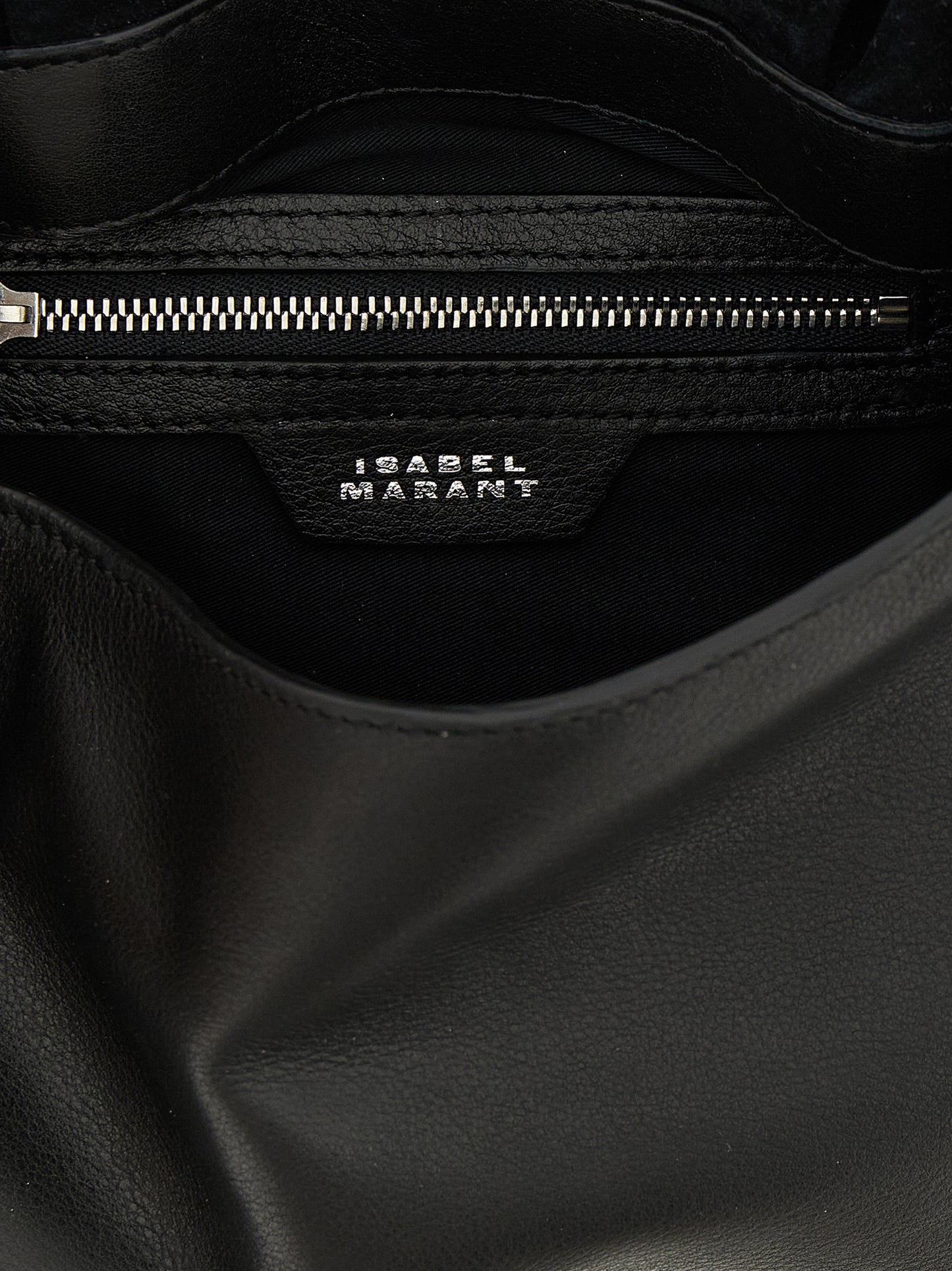 Shoulder Flap Bag by Isabel Marant for women in calfskin leather black features an effortlessly chic silhouette with a secure flap & magnetic, ample , and versatile shoulder-strap for effortlessly chic everyday luxury.