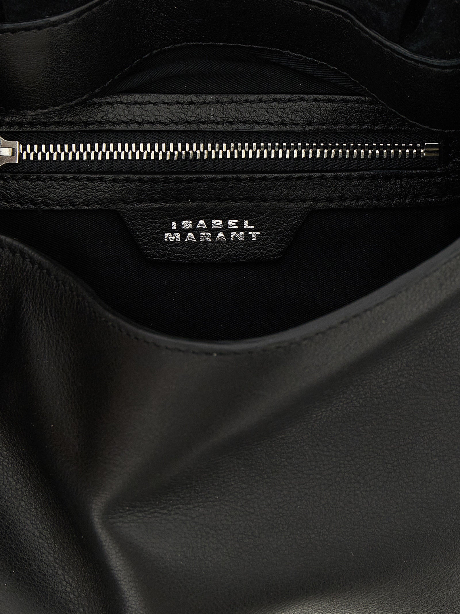 Shoulder Flap Bag by Isabel Marant for women in calfskin leather black features an effortlessly chic silhouette with a secure flap & magnetic, ample , and versatile shoulder-strap for effortlessly chic everyday luxury.