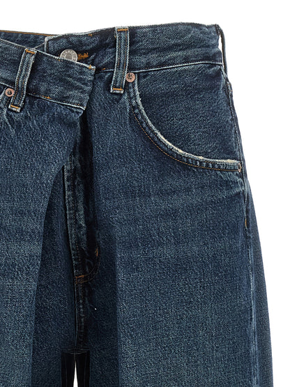 Jeans by Agolde for women in denim cotton blue features a polished silhouette with a polished straight-leg & wide, reaching a polished long and finished with a polished .