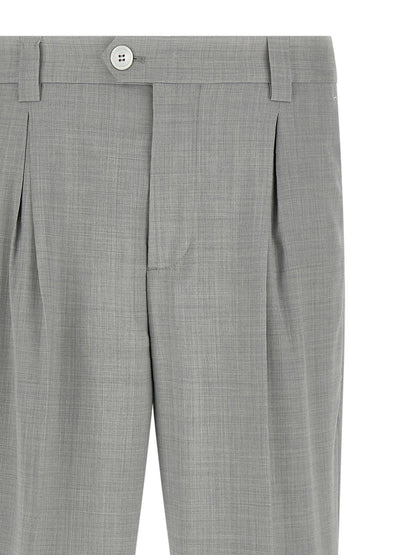 Trousers by Brunello Cucinelli for men in virgin wool & canvas gray presents a perennial silhouette, meticulously tailored with a regular-fit cut, long finish, and an elegant .