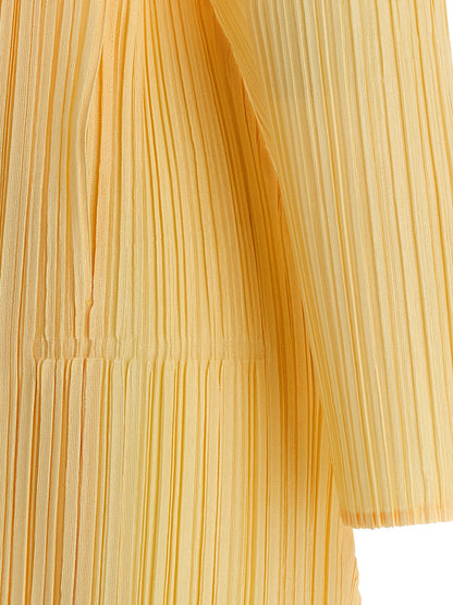 Cardigan by PLEATS PLEASE ISSEY MIYAKE for women in polyester bicolour & yellow features a dramatic silhouette, showcasing a sophisticated and dramatic detail for a timeless, premium look.