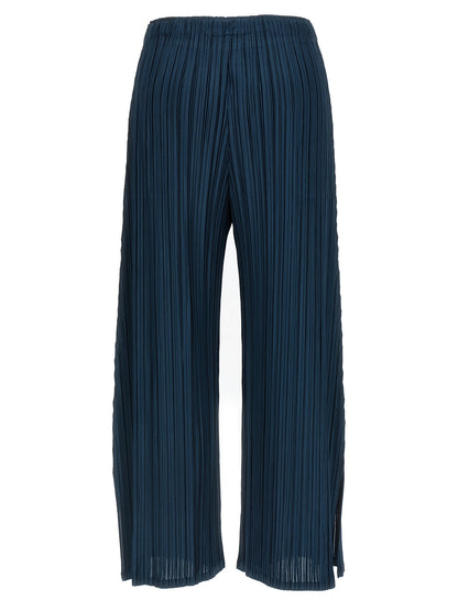 Casual Pants by PLEATS PLEASE ISSEY MIYAKE for women in polyester blue & signature presents a tailored silhouette, showcasing a tailored wide and long cut with a refined for a truly tailored aesthetic.
