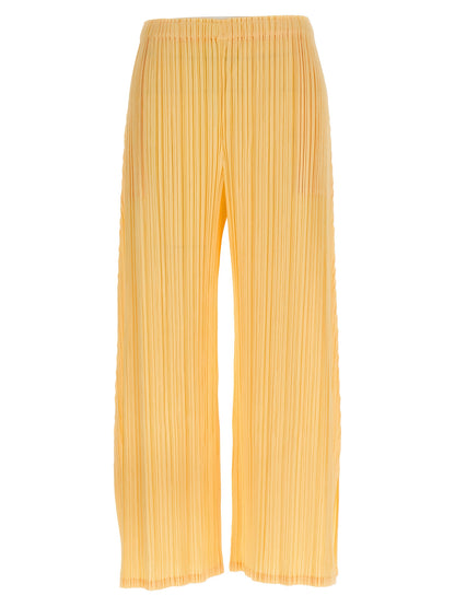 Casual Pants by PLEATS PLEASE ISSEY MIYAKE for women in polyester bicolour & yellow features a refined silhouette with a refined wide, defined by a and a refined long for a refined finish.