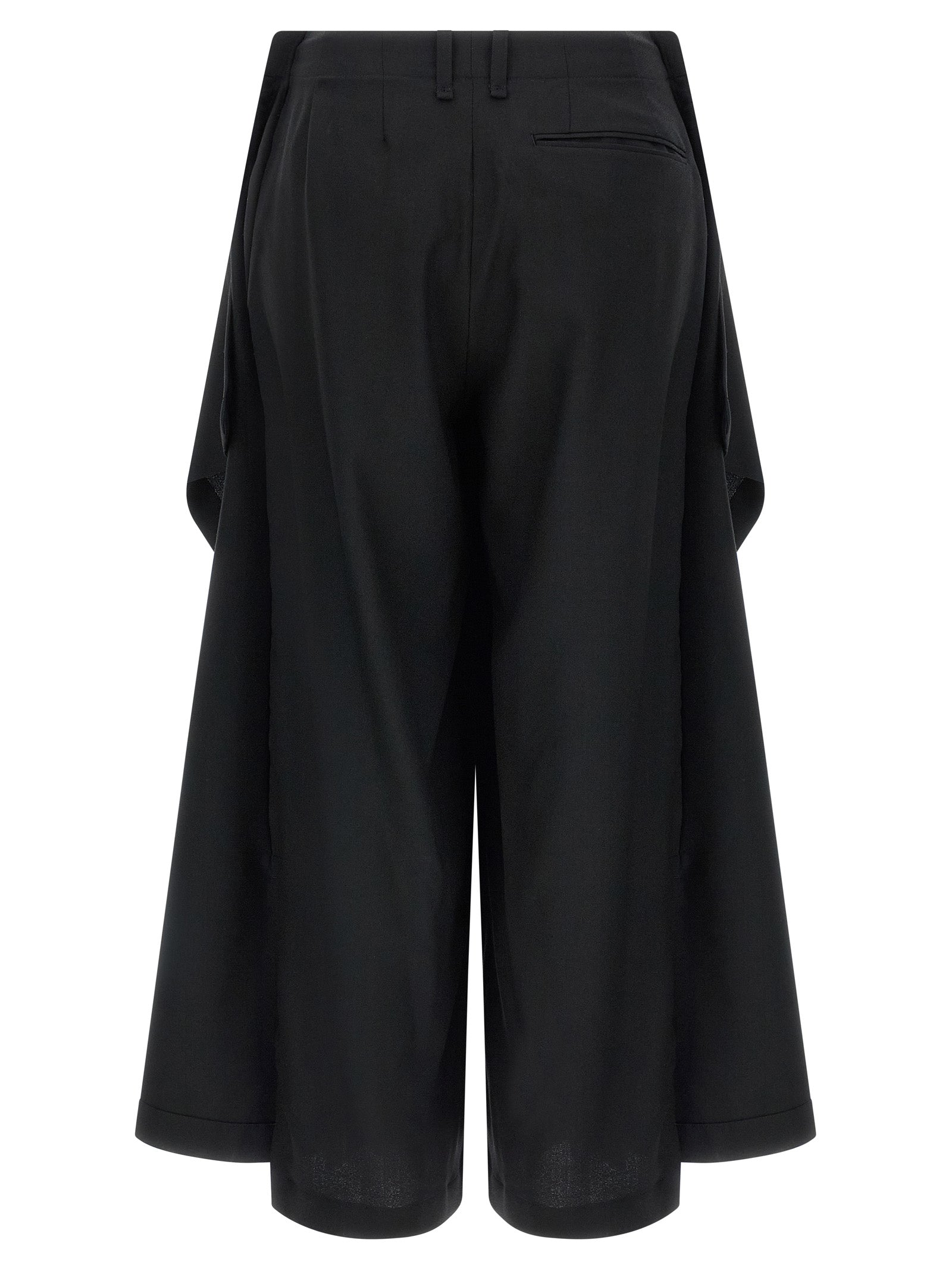 Trousers by Issey Miyake for women in wool black & signature features a artisanal silhouette, showcasing a sophisticated wide with a long and for a artisanal finish.