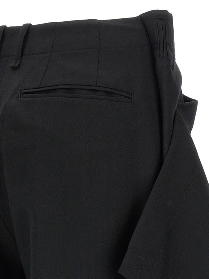Trousers by Issey Miyake for women in wool black & signature features an on trend silhouette, showcasing a sophisticated wide with a long and for an on trend finish.