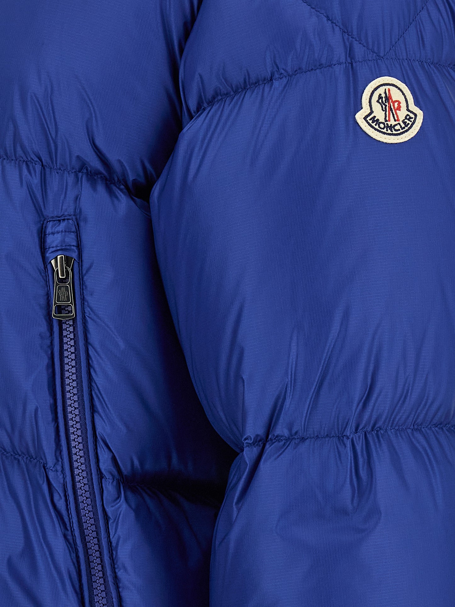 Hooded Puffer Jacket by Moncler for men in polyamide wool & goose-down blue & signature showcases a bohemian silhouette, artfully detailed with a bohemian and signature hooded & insulated for a truly bohemian finish.